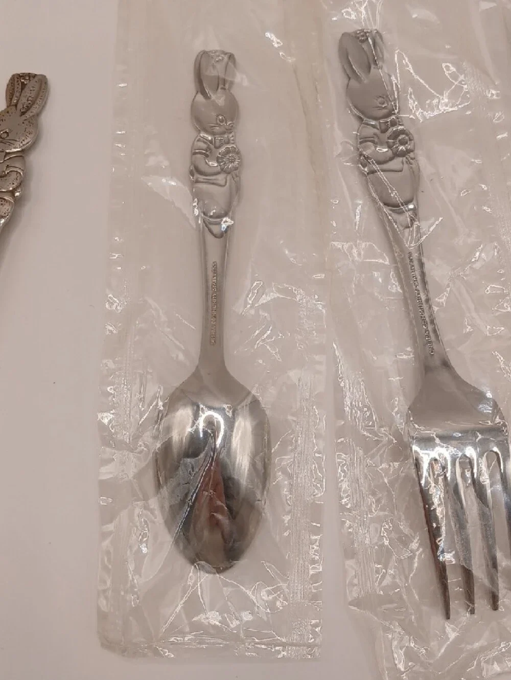 Oneida Peter Rabbit Child's Vtg Stainless Flatware Set of 4 (3 new, 1 used)